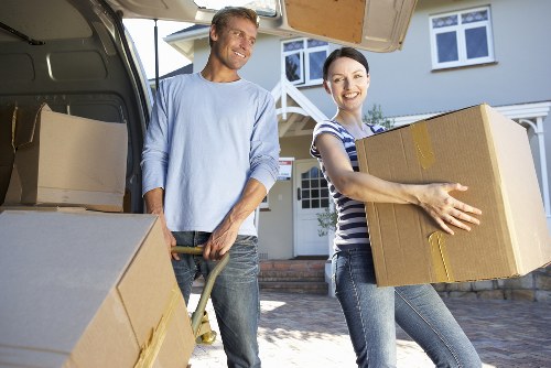 Local removal team loading furniture for an Enfieldhighway move