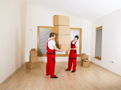 Removal van loading household items for a move in Enfieldhighway